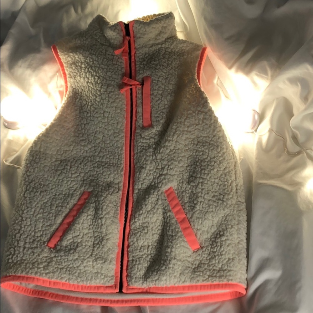 White and pink vest